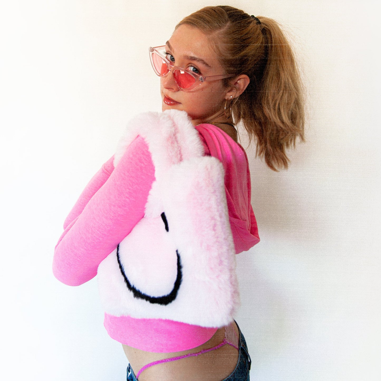 pink smiley cowgirl clutch