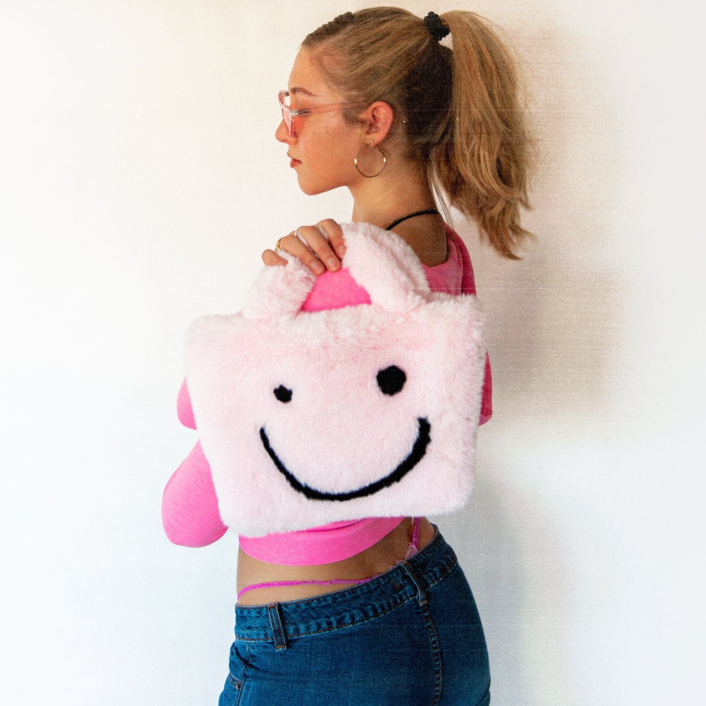 pink smiley cowgirl clutch