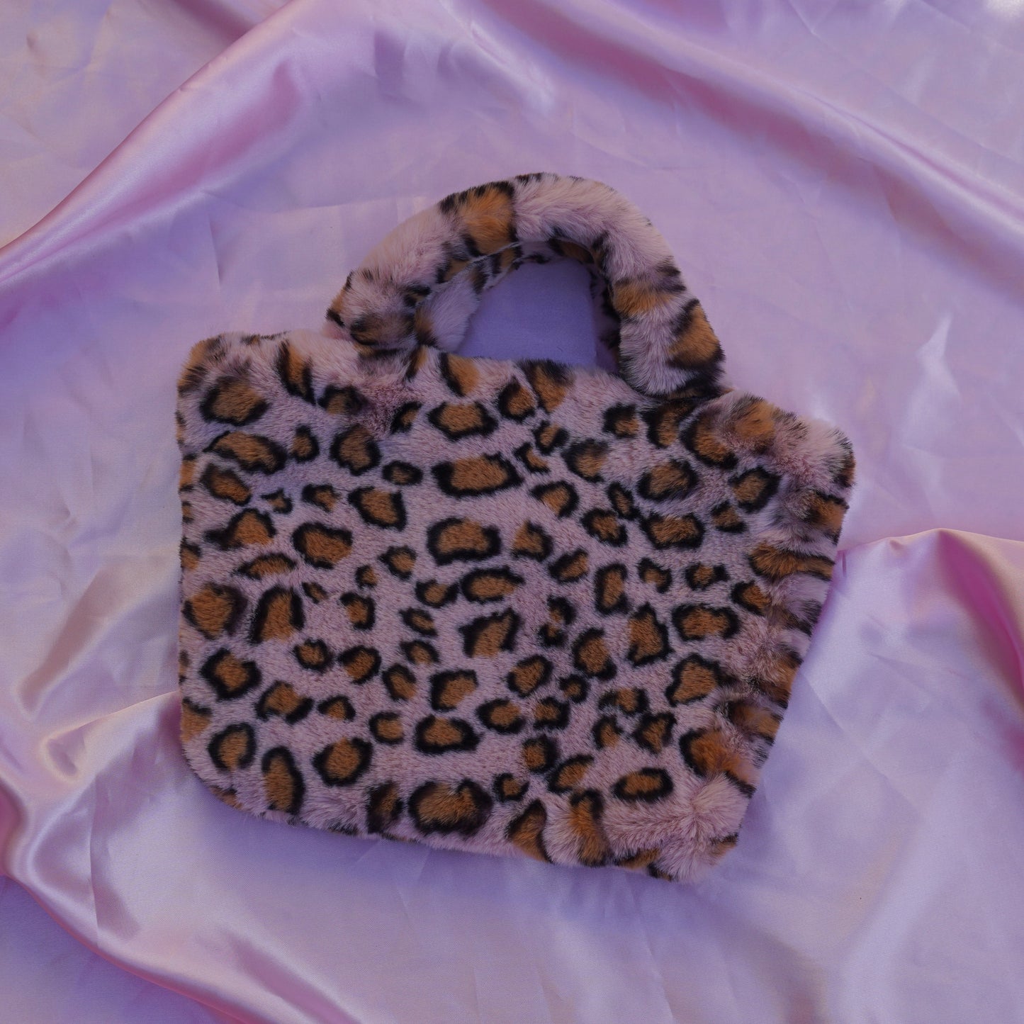 pink jaguar cowgirl clutch