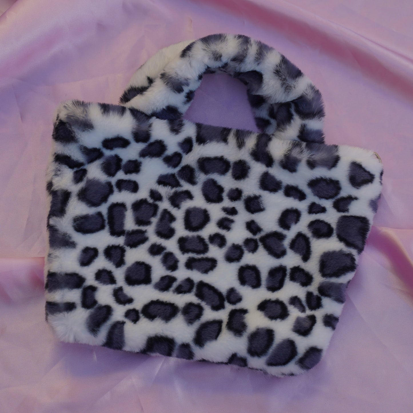 snow leopard cowgirl clutch