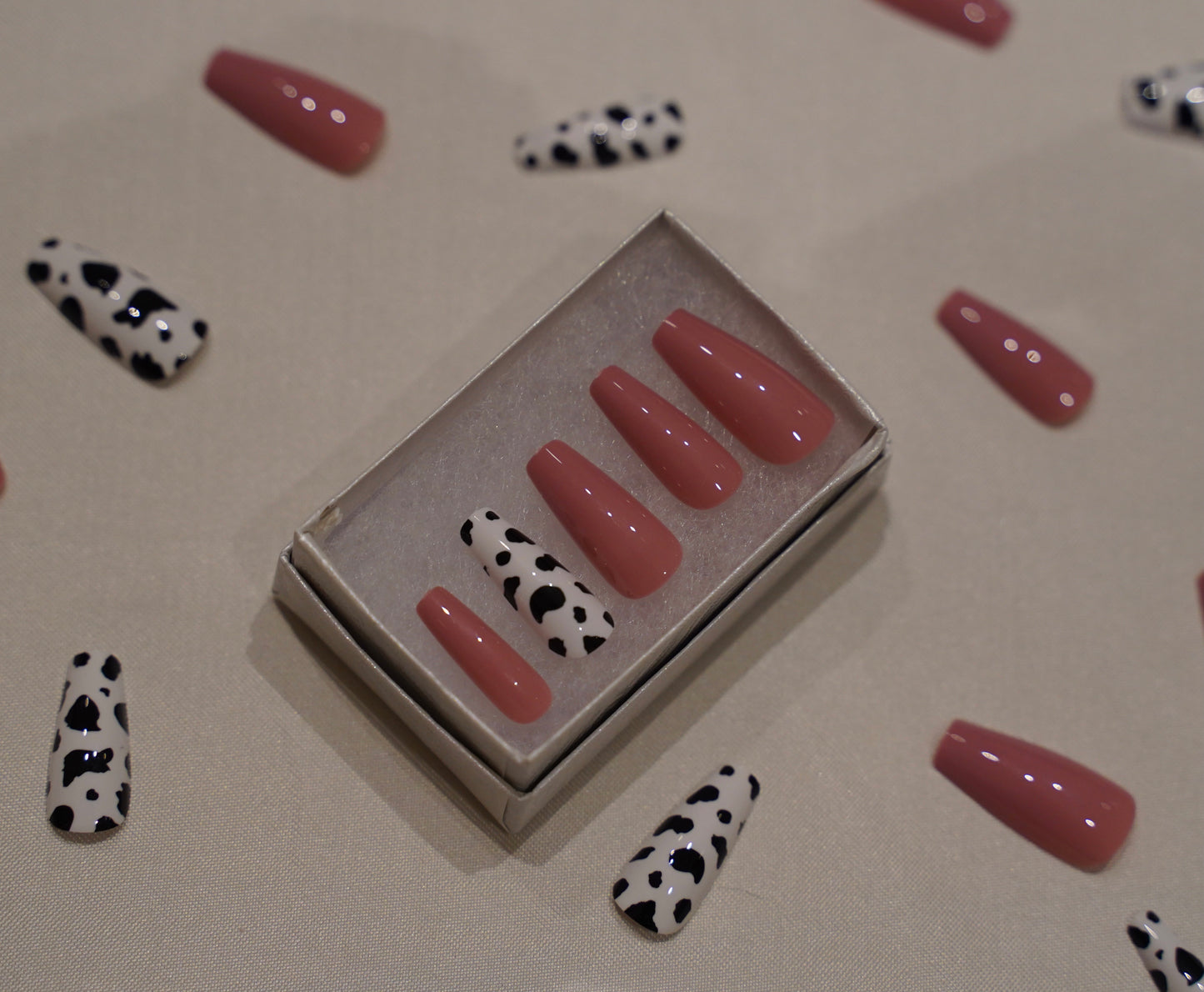 dark rose cow nails