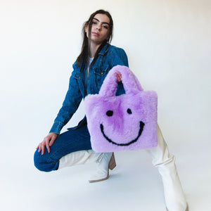 purple smiley cowgirl clutch