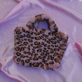 pink jaguar cowgirl clutch